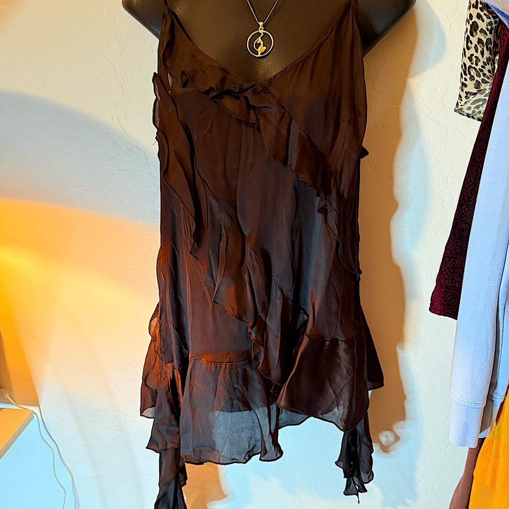 NWT -Free People` Shake your love ruffle Tunic Top . Black